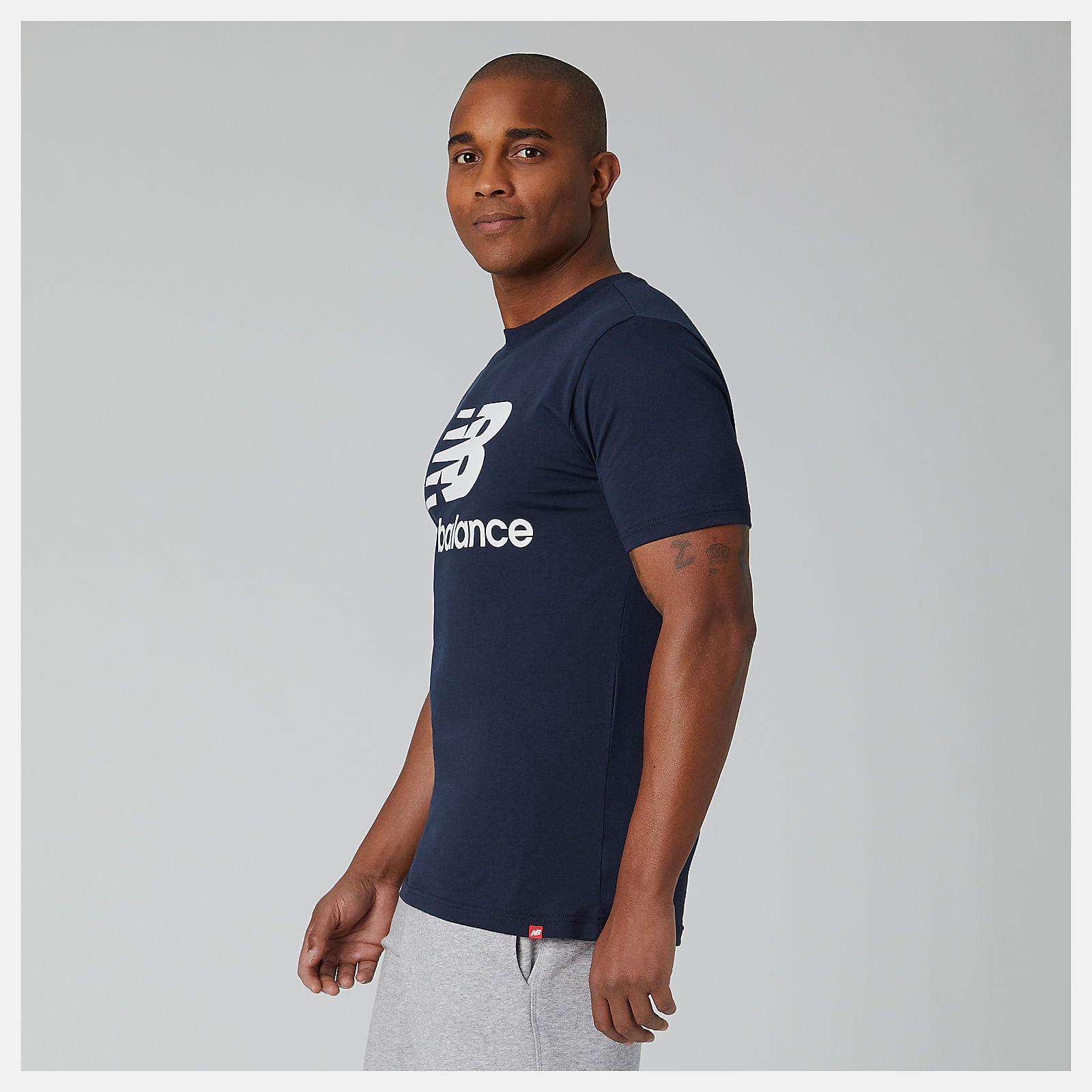 Essentials Stacked Logo Tee | New Balance Clothing Eclipse - Men