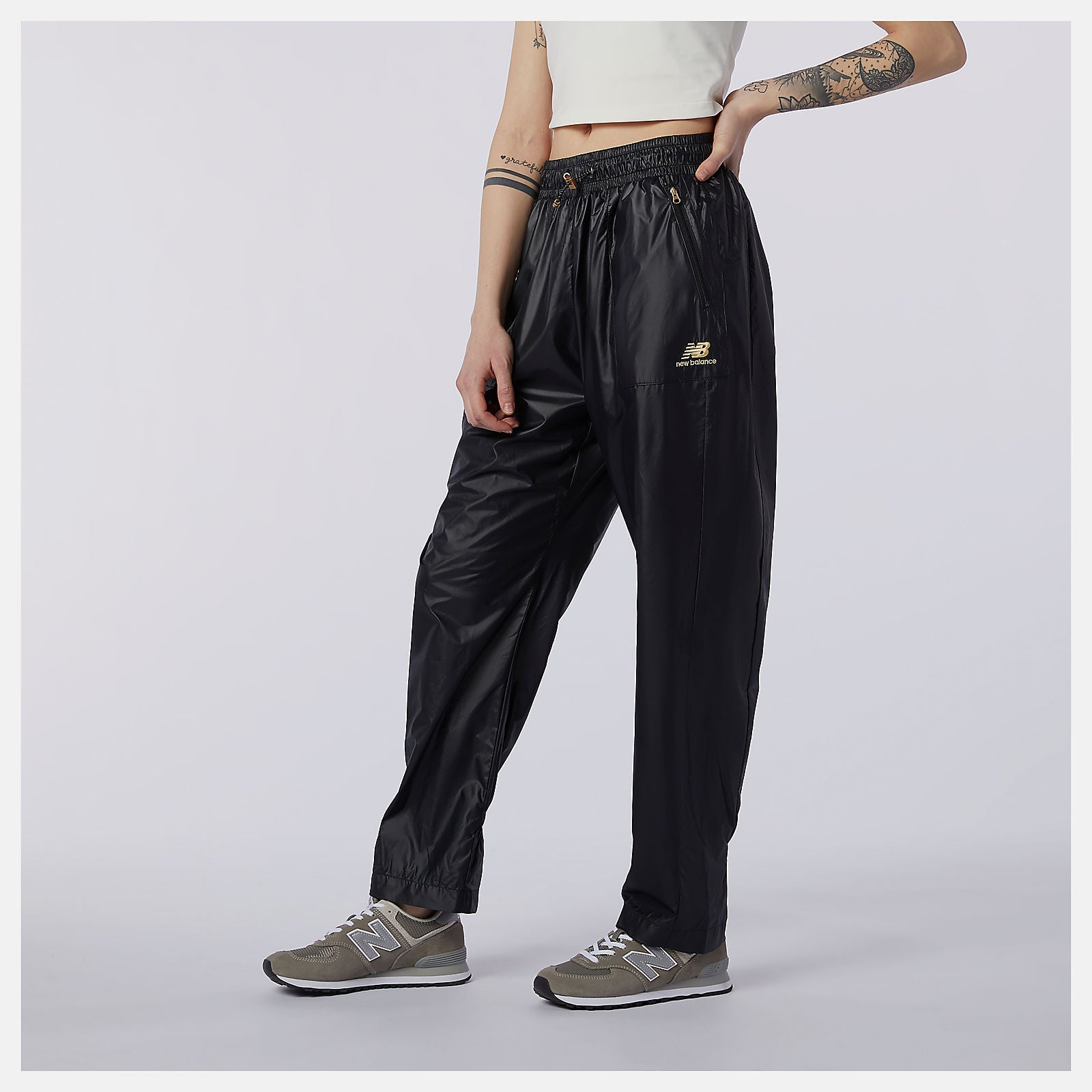 NB Athletics Higher Learning Wind Pant | New Balance Clothing Black - Women